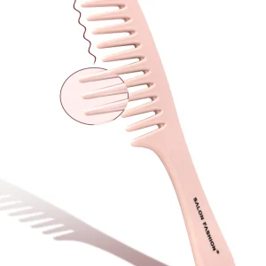 peigne grosse dents cheveux bouclés rose